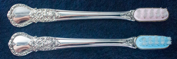 pewter toothbrushes for baby gifts in pink and blue